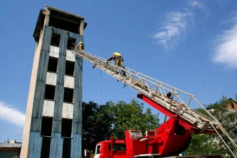 Fireman  on the stairs Stock Photos