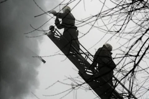 Fireman on the stairs Stock Photos