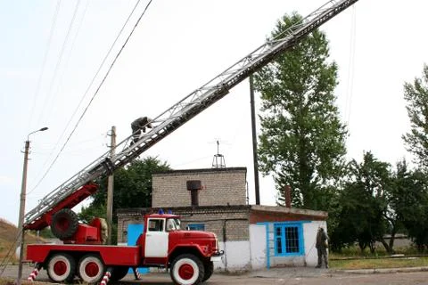 Fireman on the stairs Stock Photos