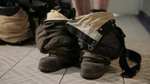 Fireman suiting up Stock Footage 77045460