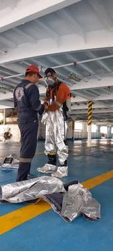 Fireman suits Stock Photos