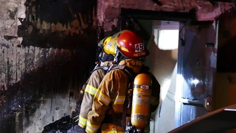 Fireman taping with ax Stock Footage 115966361