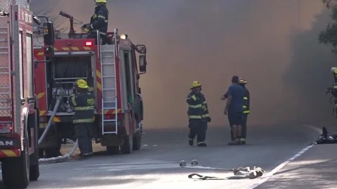 Fireman Teamwork Extinguish Water Disaster Firefighter Disaster Flame Stock Footage 145867189