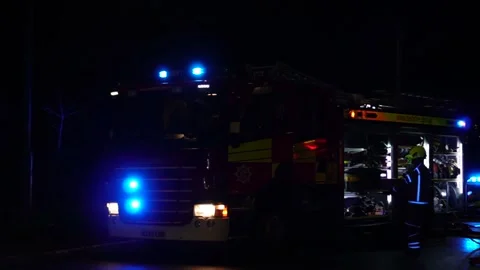 Fireman using firetruck Stock Footage 232072022