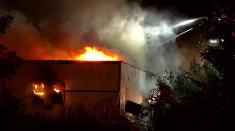 Fireman ventilating building on fire with pike pole Video stock 41817499