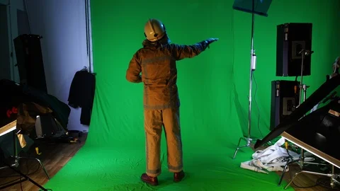 Fireman waiving his hand on the fire (chromakey) Stock-Footage 99187253