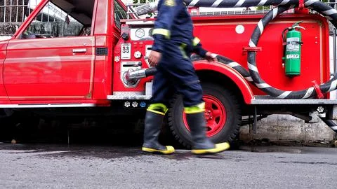 Fireman walking Stock Photos