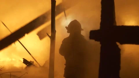 Fireman at work. Burning house. Stock Footage 221386628