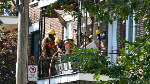 Fireman working on balcony Stock Footage 116076588