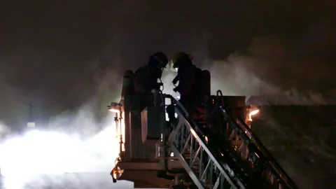 Fireman working hard Video stock 139657120