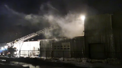 Firemen analyzing fire situation Stock Footage 104233177