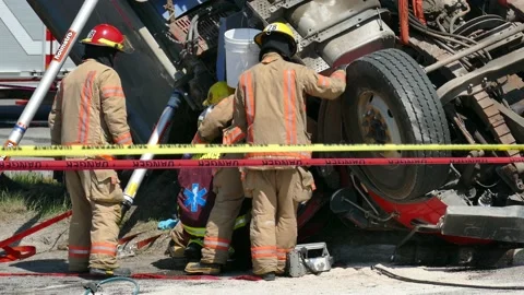 Firemen and EMS working in team at accident Video stock 133269184