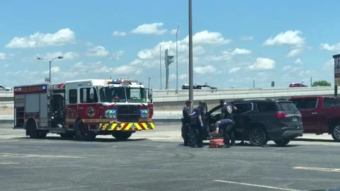 Firemen assisted the driver Stock Footage 245679462