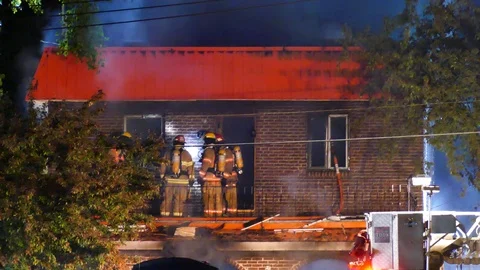 Firemen on balcony with smoke Stock Footage 114769123