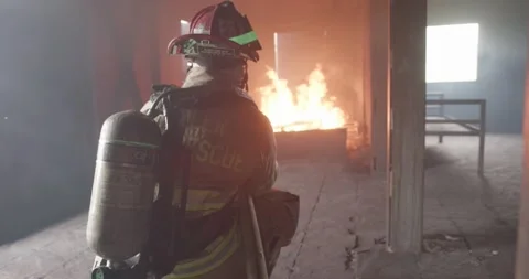 Firemen battle blaze Stock Footage 220575061