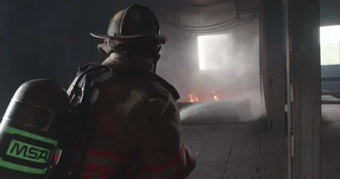 Firemen battle blaze Stock Footage 220575103