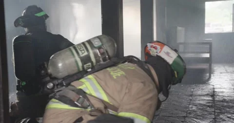 Firemen battle blaze Stock Footage 220576080