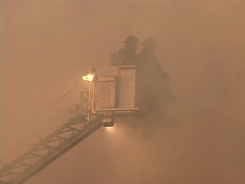 Firemen in bucket Stock Footage 27249096