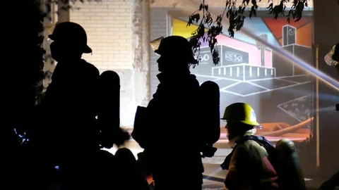 Firemen in the dark Stock Footage 116078932