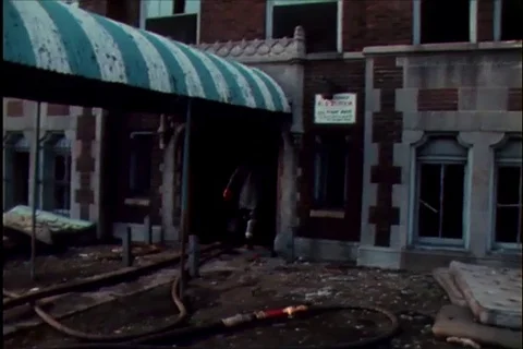 Firemen enter and leave burning building during Chicago Riots - 1968 Stock Footage 106057830