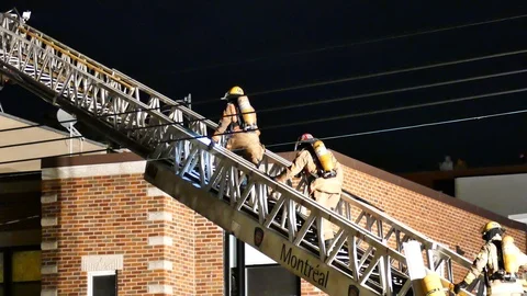 Firemen escalading ladder Stock Footage 120162890