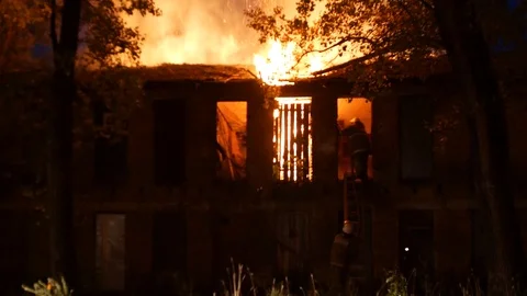 Firemen extinguish the fire Stock Footage 115841339