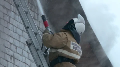 Firemen is fighting with fire. Stock Footage 72912827