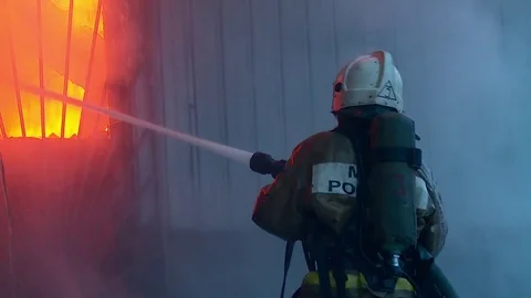 Firemen is fighting with fire. Stock Footage 72913102