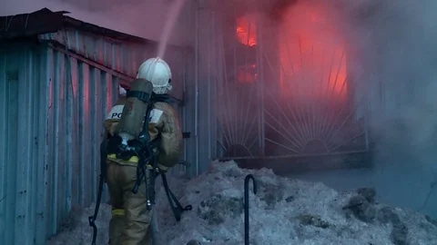 Firemen is fighting with fire. Stock Footage 72913111