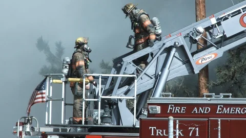 Firemen Fighting Fire In The Smoke Video stock 88178706