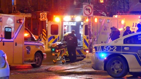 Firemen getting stretcher out Stock Footage 125471835