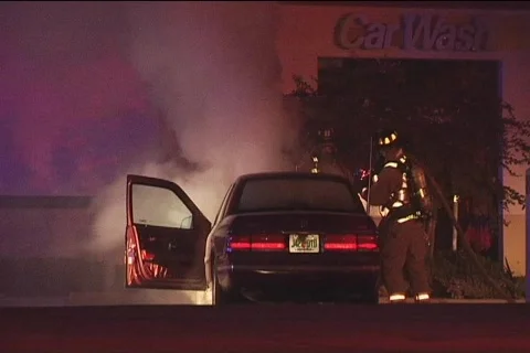 Firemen Hose Burning Car Engine 動画素材 857530