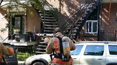 Firemen in a hurry Stock Footage 116025815