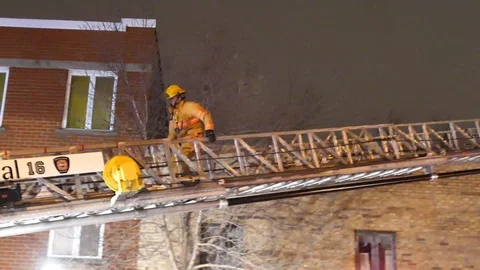 Firemen on ladder Stock Footage 101993221