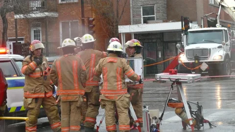 Firemen organisating intervention after crane incident Stock Footage 133274767