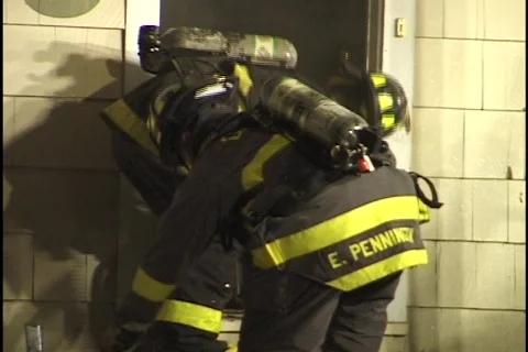 Firemen Pull Dummy Out of House Stock-Footage 297516