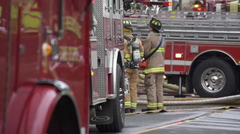 Firemen at the Scene of a House Fire Stock Footage 45323510