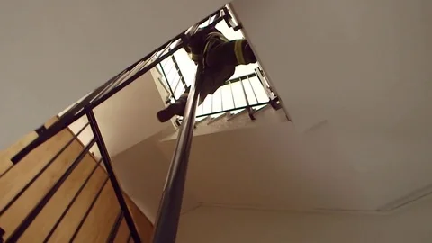 Firemen sliding down pole Video stock 77045776