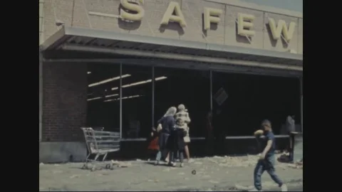Firemen spraying water on the burning building while civilians watching - 1968 Vídeos de archivo 83659309