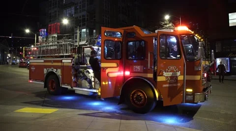 Firemen Step onto Engine and close doors Stock Footage 46836886