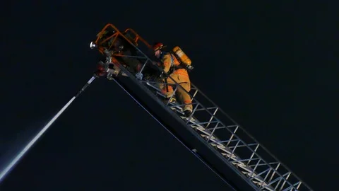 Firemen on the top of ladder Stock Footage 115970990