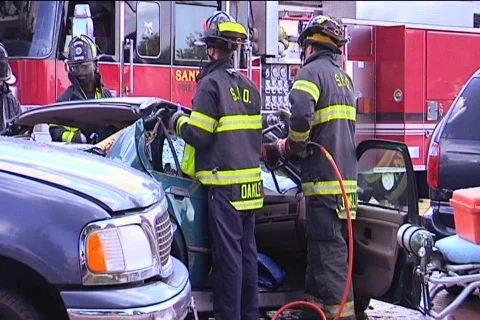 Firemen Use Jaws of Life to Remove Vehicle Roof 動画素材 852123
