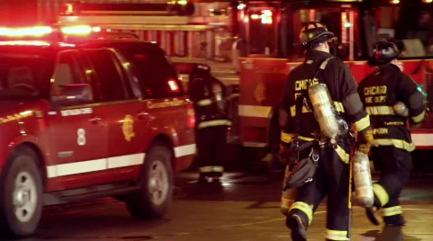 Firemen Walking Stockbeeldmateriaal 645283