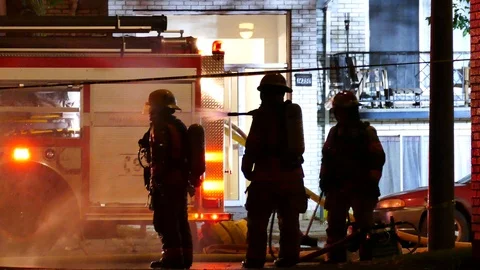 Firemen washing other firemen Stock Footage 120162619