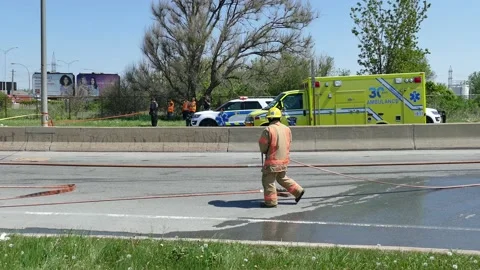 Firemen working hard at massive accident Stock Footage 133269520