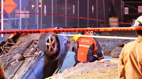 Firemen working on a physical rescue car accident Stock Footage 101987845