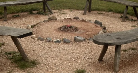 Firepit with circle of seats in nature Stock Footage 111998706