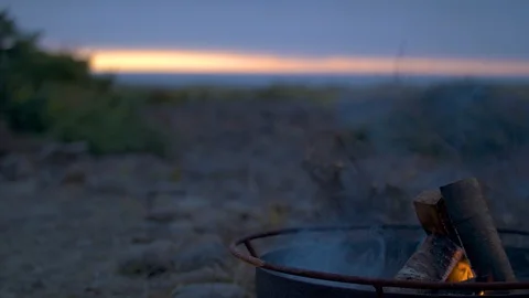 Firepit on the Oregon Coast During a Sunset Stock Footage 96008834