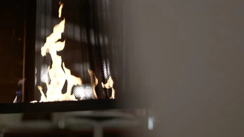 Fireplace artistically framed in background Stock Footage 170377936