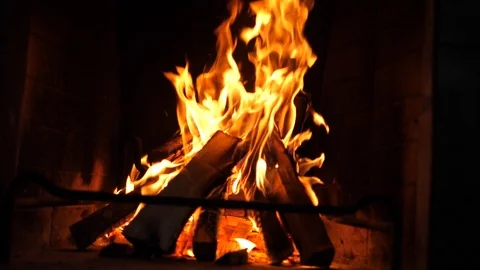 Fireplace buring in slow motion at night in the attic at home.Closeup Isolated Stock Footage 123607869